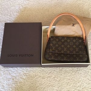 Louis Vuitton purse, bag and box.